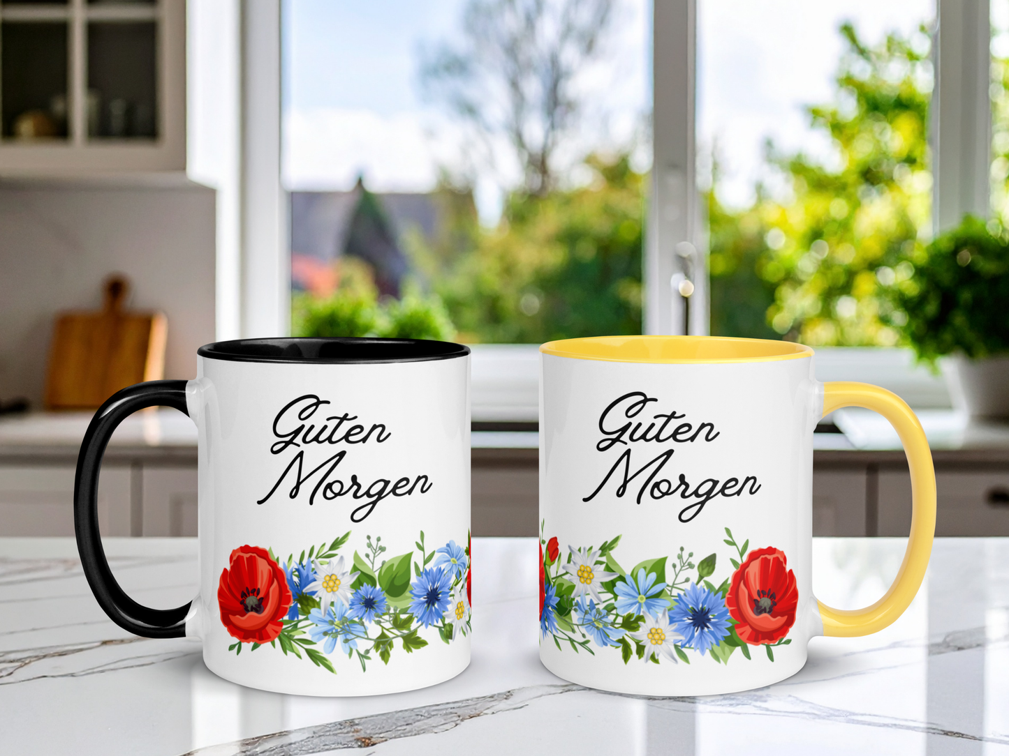 Two mugs, one black one yellow, with floral designs and 'Guten Morgen' text on a kitchen counter.