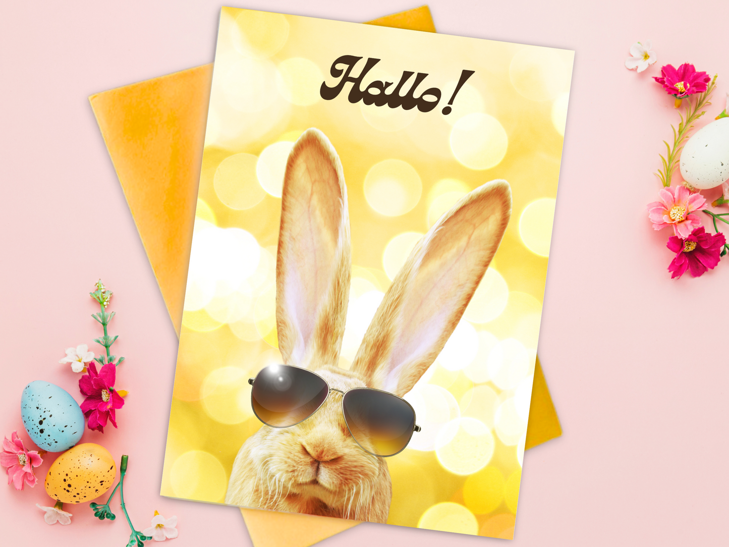 German Easter card with a long eared hare rabbit wearing sunglasses on a yellow background, card says "Hallo!"